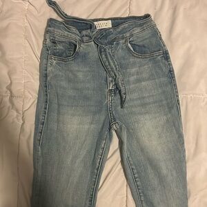 Light blue denim jeans with a tie waist!